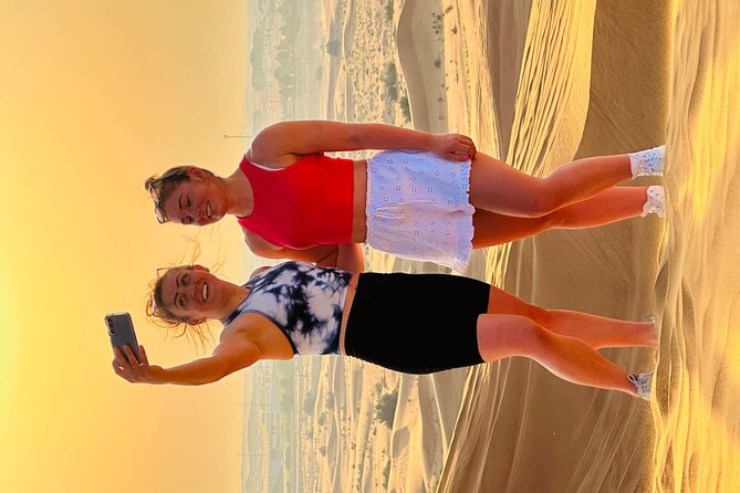 Dubai Sunset Red Dune Desert Safari, Sandboarding and Camel Ride - BBQ dinner and camp shows: worth it if you want the full evening