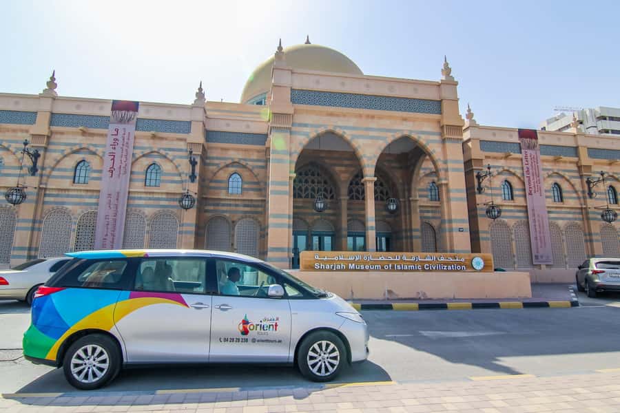 Dubai: The Pearl Of The Gulf - Half Day Sharjah City Tour - Iranian Market time: carpets, jewelry, and bargaining energy