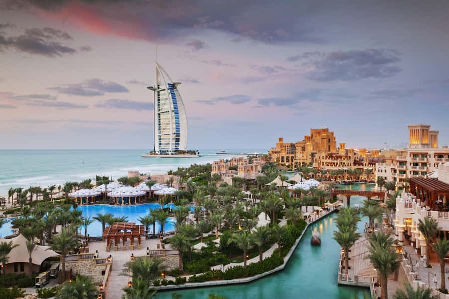 Dubai: Top 15 Must-See Dubai Sightseeing Tour in a SUV/VAN - Downtown Dubai: Emaar Boulevard, Burj Khalifa framing, and iconic wing photos