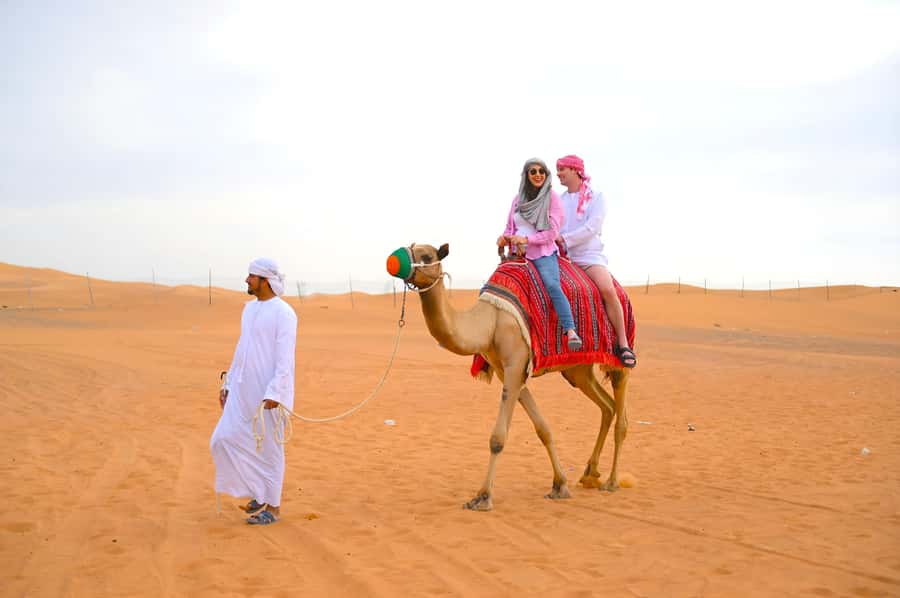 Dubai: Tour with BBQ Dinner, Camel Ride, & Traditional Show - Dune Bashing and Sandboarding: The Thrill Part, With Safety in Mind