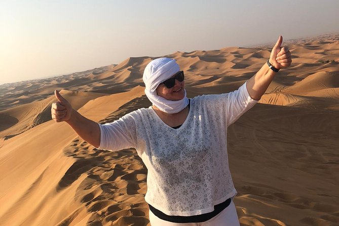 Dubai: Unique MORNING Quad Bike Red Dunes Safari - Quad bikes on high dunes: what you are really signing up for