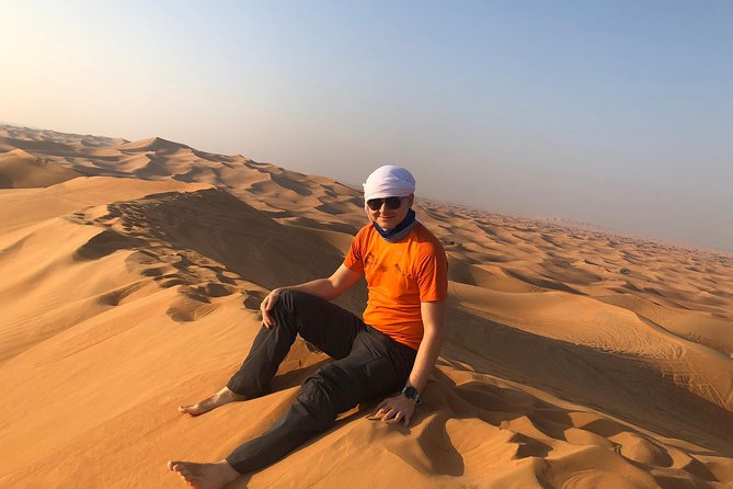 Dubai: Unique MORNING Quad Bike Red Dunes Safari - Water in the desert: small included details that matter
