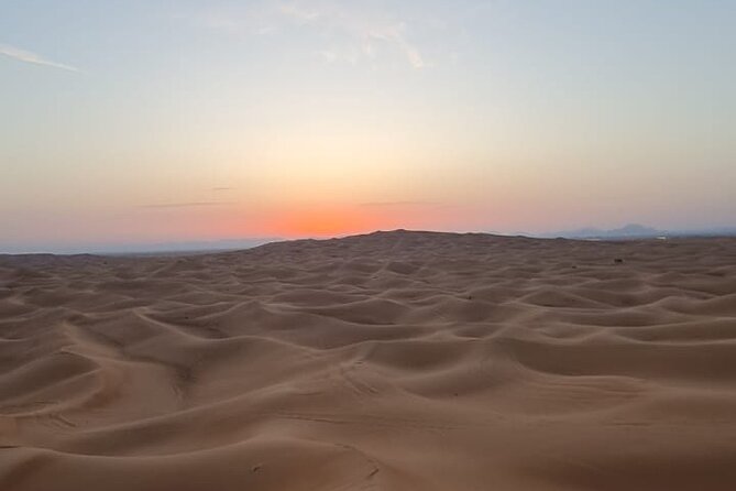 Dubai: Unique SUNRISE 4WD Red Dunes Safari - Camel ride: slow-motion desert views to cool down the adrenaline