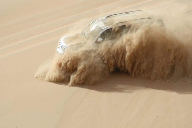 Dubai: Unique SUNSET 4WD Red Dunes Safari - The desert timing is the whole point