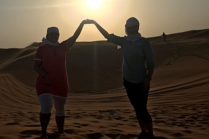 Dubai: Unique SUNSET 4WD Red Dunes Safari - Camel ride and photo stops: why you need the slower moments