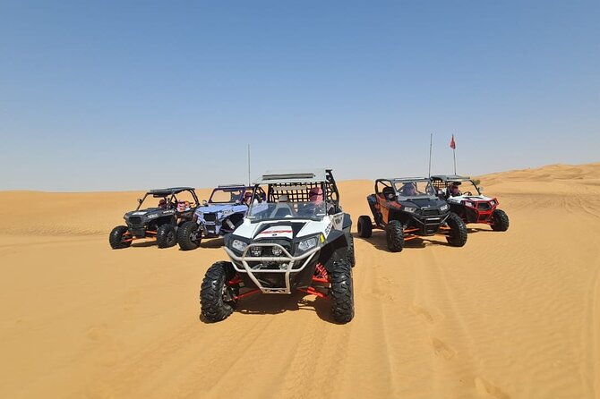 Dubai: Unique SUNSET Buggy Red Dunes Safari - Sandboarding and camel ride: adrenaline plus a slower pace