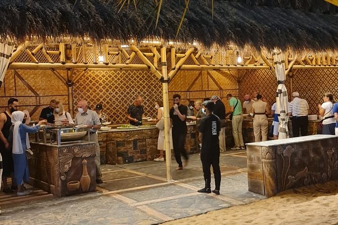 Dubai: Unique SUNSET Buggy Red Dunes Safari - The traditional desert camp BBQ, tanoura, belly dance, and henna