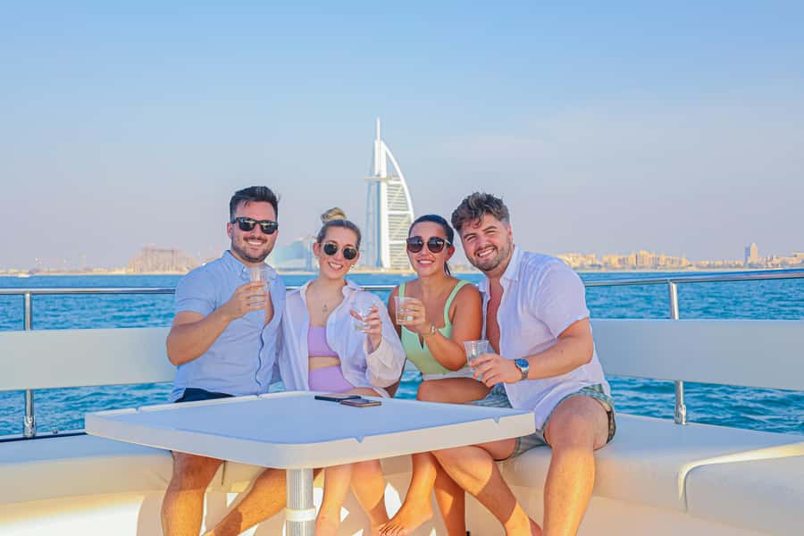Dubai Waves & Dunes: Luxury Yacht Cruise w/ Red Dunes Safari - Sandboarding and camels: controlled fun after the adrenaline
