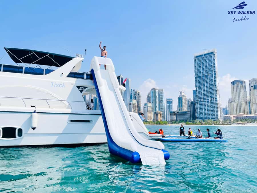 Dubai: Yacht Cruise with Swimming, Snorkeling and BBQ Lunch - Sky-High Views, Then Splash Time at JBR