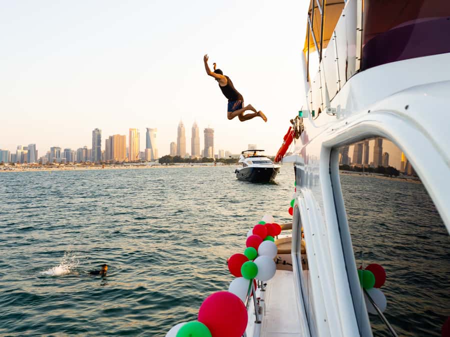 Dubai: Yacht Cruise with Swimming, Snorkeling and BBQ Lunch - Slide Option and Jet Ski Extras: Pick Your Level of Chaos