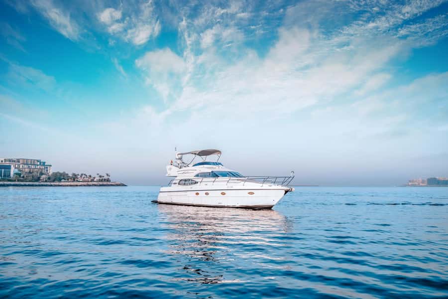Dubai Yacht Tour - Boat Trip upto 12 guests Private event - Onboard Comfort: Wi-Fi, Music, Towels, and Practical Details
