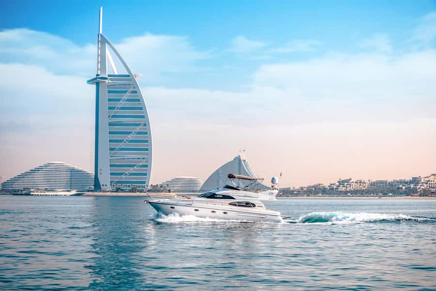 Dubai Yacht Tour - Boat Trip upto 12 guests Private event - Route Options: Dubai Marina, JBR, Canal, and the Palm Stop