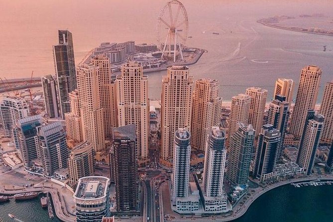 DXB Private Half-Day Dubai City Tour: Iconic Sights & Landmarks - Dubai Gold Souk Area: Old Town Streets and Shopping Momentum