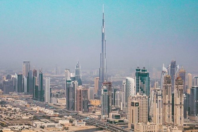 DXB Private Half-Day Dubai City Tour: Iconic Sights & Landmarks - Burj Al Arab Drive-By: The Sail-Shaped Icon, Best Seen as a Photo Moment