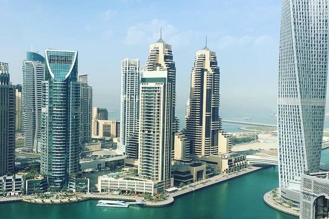 DXB Private Half-Day Dubai City Tour: Iconic Sights & Landmarks - Palm Jumeirah and Atlantis: When Dubai Goes Big and Fun