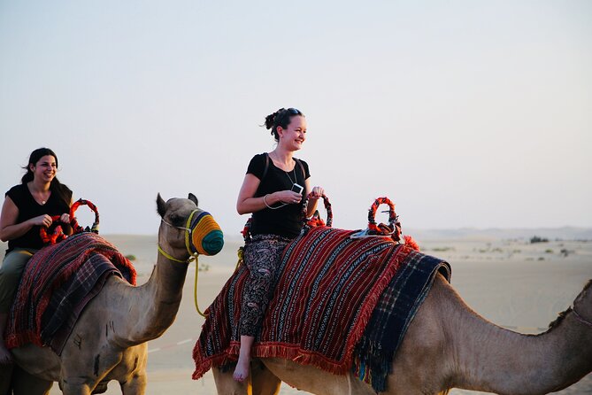 Evening Desert Safari Abu Dhabi with Hot BBQ Dinner - Sandboarding and skiing: the fun you control