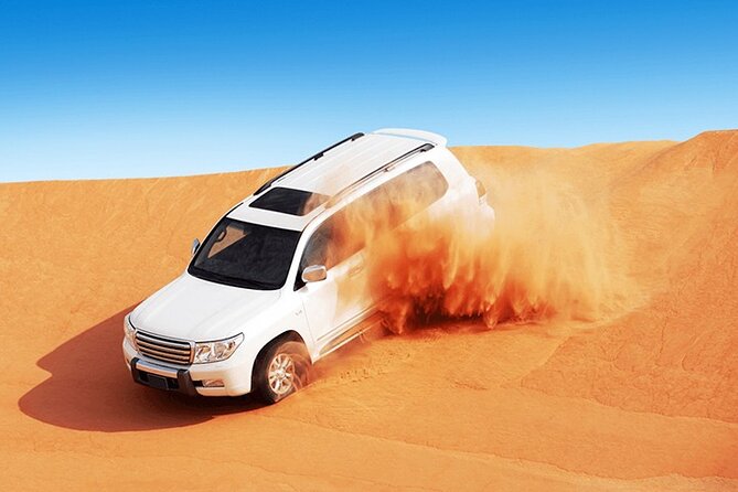 Evening Desert safari Dubai With Quad Bike Ride & BBQ dinner - The shows: tanura, belly dancing, and fire