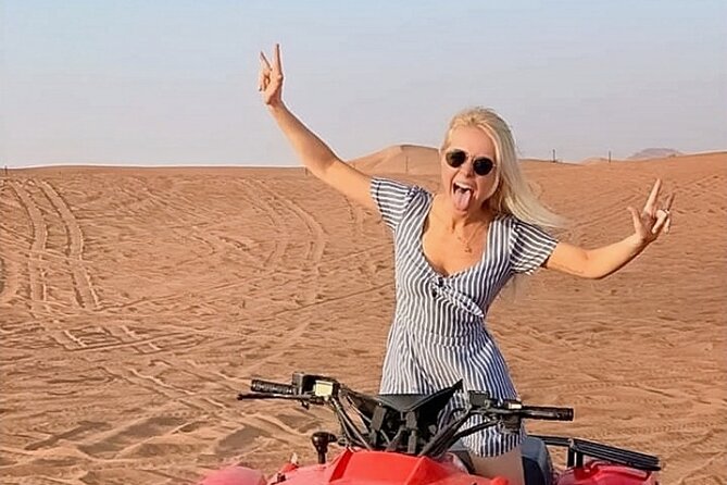 Evening Desert Safari from Dubai with Quad Bike Ride - Camp Arrival: Arabic Tea Welcome, Henna, Falcon Photos, and Dress Pictures