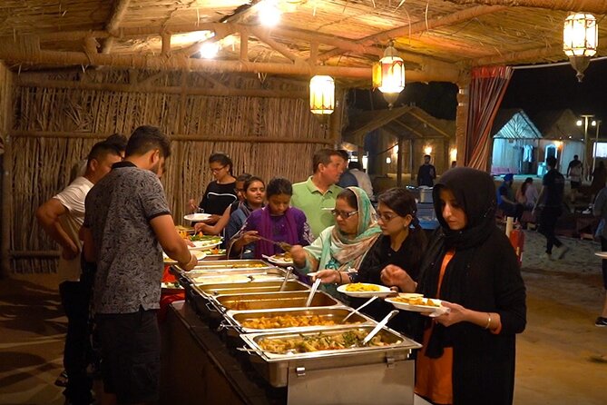 Evening Desert Safari Tour With Dinner & Entertainment - Dinner Details: BBQ Buffet, Starters, and What to Expect From the Meal