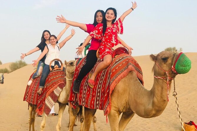 Evening Desert Safari Tours - Mid-desert photo shoot, henna, Arabic dress, and falcon moments