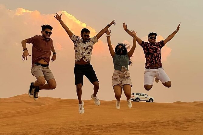 Evening Desert Safari with BBQ Buffet Camel Ride and Arabic Shows - Sandboarding at camp plus henna and Arabic outfit photos