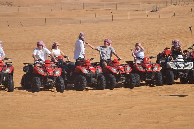 Evening Desert Safari with BBQ Buffet Camel Ride and Arabic Shows - Live desert shows: belly dancing, fire dance, and Tanura