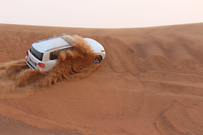 Evening Desert Safari with BBQ Dinner - Belly dance and fire show: how the evening stays fun after dinner