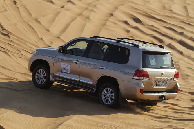 Evening Desert Safari with Bbq Dinner and Entertainment - Fire show, belly dancing, and Tanoura spinning: the finale energy