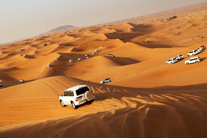 Evening Desert Safari with BBQ Dinner & self-drive Quad biking - Lahbab Dune Bashing: The Fast Start You Get in 35 to 40 Minutes