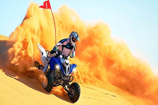 Evening Desert Safari with BBQ Dinner & self-drive Quad biking - Camel Ride, Sunset Photo Stop, and Calm Views Between Thrills