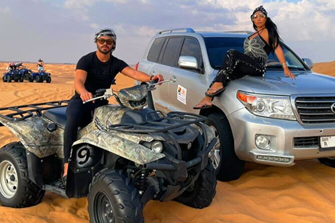 Evening desert safari with camel ride and BBQ dinner - Dune Bashing and Sunset Photo Stops on the Red Sands