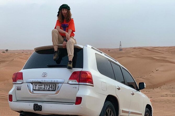 Evening Dubai Desert Safari Experience with Dinner and Shows - Lahbab Red Dunes: Dune Bashing and High-Dune Photo Time