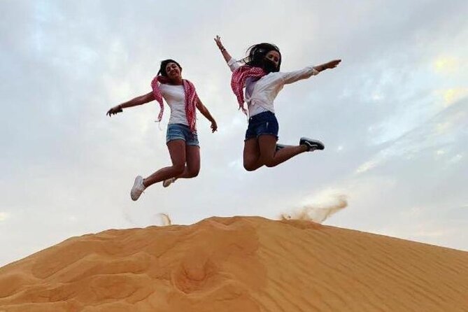 Evening Dubai Desert Safari Experience with Dinner and Shows - Dinner on Carpet Pillows: BBQ Buffet, Soft Drinks, and Sheesha