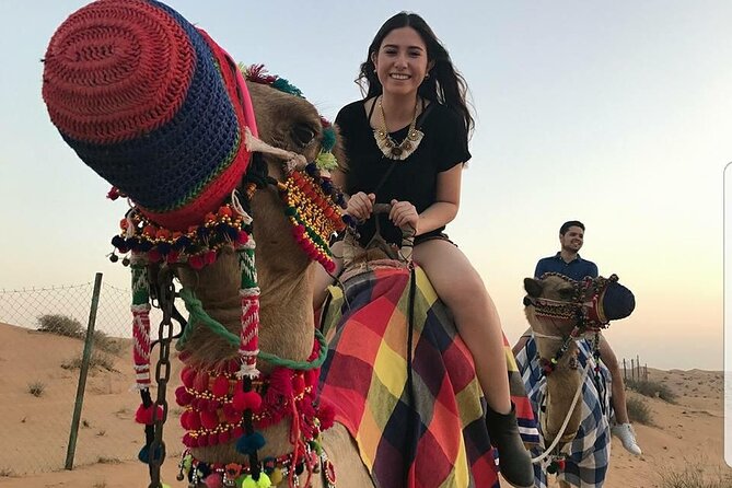 Evening Dubai Desert Safari Experience with Dinner and Shows - Desert Camp Welcome: Coffee, Dates, Henna, and Arabic Dress Photos