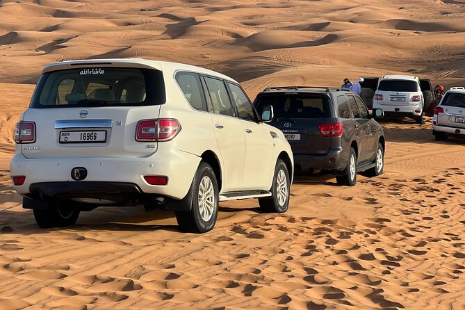 Evening Red Dune Desert Safari in Dubai with BBQ Dinner - Shows at the Camp: Belly Dancing, LED Tanoura, and Fire