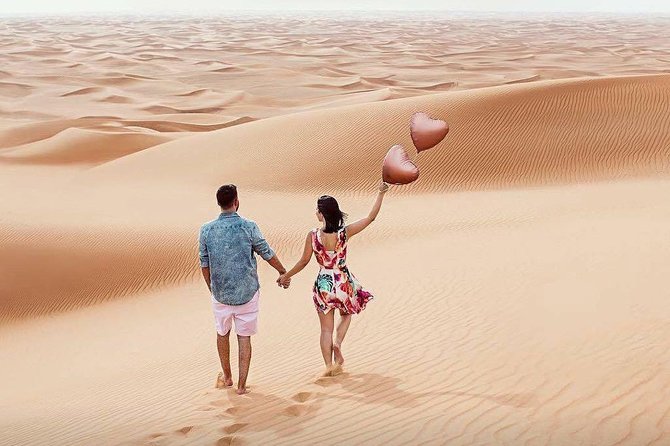 Evening Red Dunes Desert Safari: BBQ Dinner & Adventure Awaits! - Belly Dancing, Tanoura, and Fire Dancing Under Night Skies
