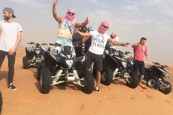 Evening Red Dunes Safari with Quad Biking, BBQ Dinner & LiveShows - Sandboarding: fun if your body is ready