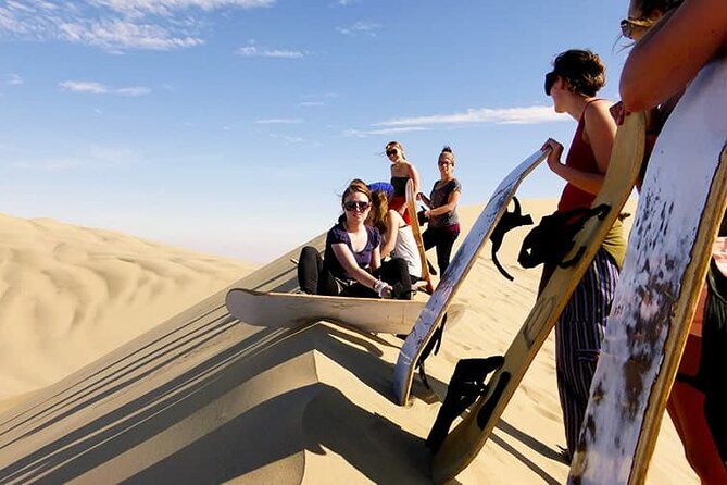 Evening Safari with Dune Bashing, BBQ Dinner and Belly Dance - Pickup in a Land Cruiser, then straight to the dunes