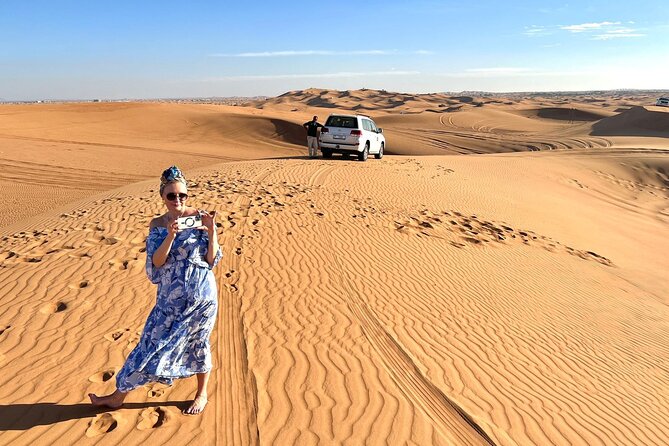 Exclusive Desert safari - Camel ride and sand boarding: short time, big atmosphere