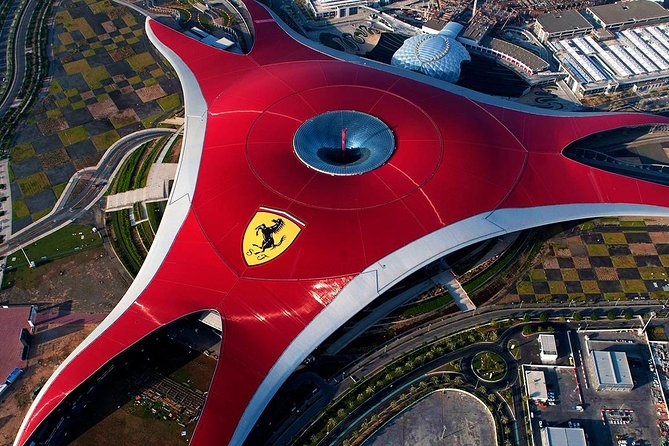 Ferrari World Theme Park and Abu Dhabi Tour with Pick Up - Entering the Sheikh Zayed Grand Mosque Center, and handling the strict dress code
