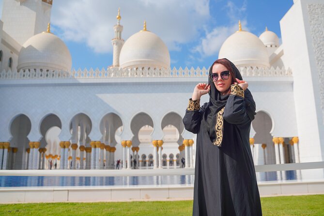 From Dubai: Abu Dhabi Sheikh Zayed Grand Mosque Guided Tour - Prayer hall wow factor: the carpet, mosaics, chandelier, and calligraphy