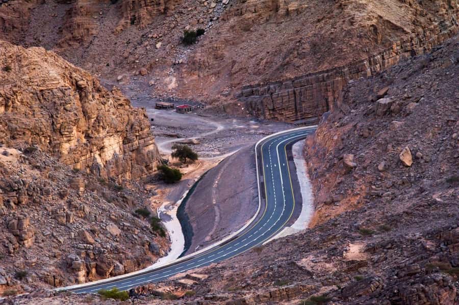 From Dubai: Jabel Jais High Mountain Tour with Transfers - Sunrise at Jabel Jais: Views, Photo Stops, and That Cooler-Air Break