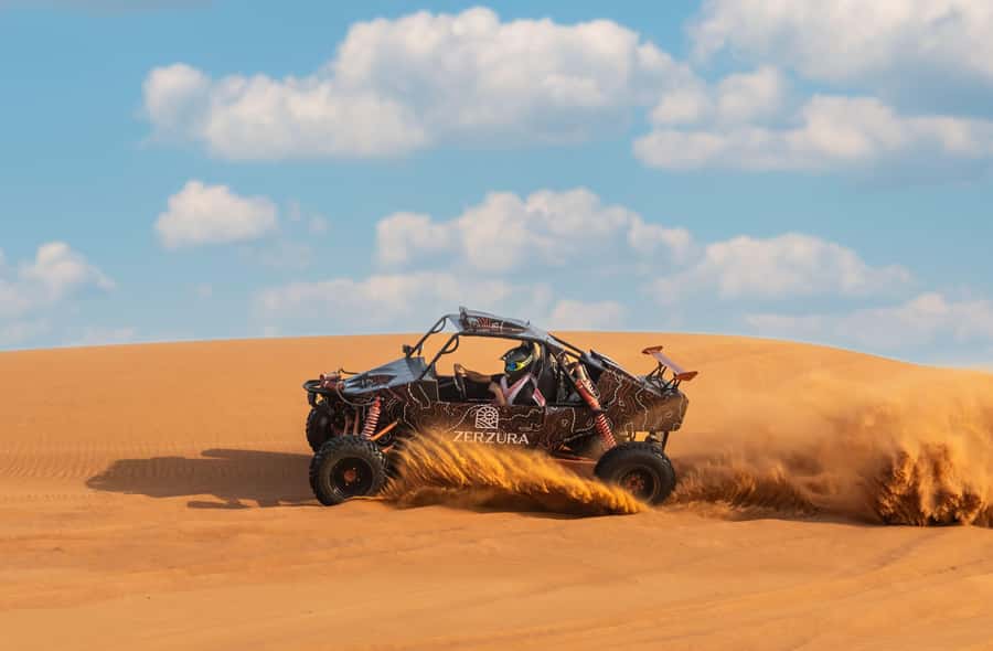 From Dubai: Zerzura Dune Buggy Experience & Fossil Discovery - Sandboarding on golden dunes: quick technique, big payoff