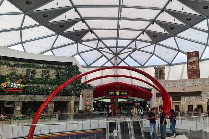 Full Day Abu Dhabi City Tour with Ferrari World - Islamic Art Centre and the Dates Market Stop: Small Stops That Add Flavor