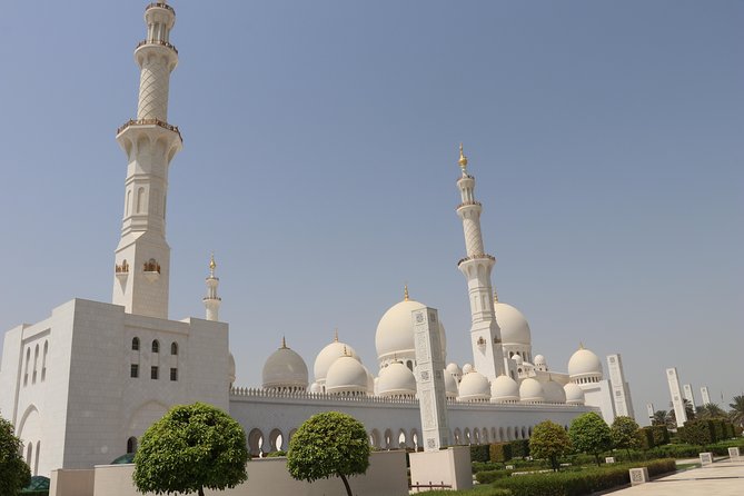 Full Day Abudhabi City Tour with Ferrari World Theme Park Ticket - Heritage Village and Etihad Towers area, old traditions meets skyline