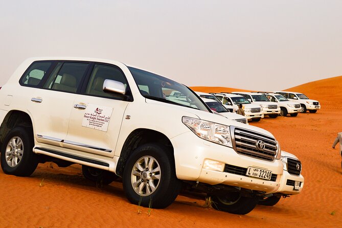 Full-Day Guided Red Dunes Desert Tour in Dubai with Camel Ride - Sunset camp: camel ride, majlis seating, and the slower rhythm