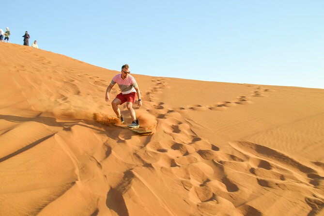 Full-Day Guided Red Dunes Desert Tour in Dubai with Camel Ride - Henna, shisha, and the inclusion reality check
