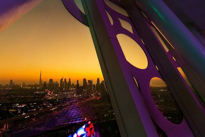 Full Day Private Dubai City Tour with Miracle Garden, Frame & Global Village - Stop 1: Burj Khalifa area, Dubai Fountain, and Atlantis The Palm time