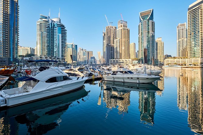 Half-Day Dubai City Tour with Blue Mosque, Creek, Souks & Abra - Al Fahidi District walk with Al Khayma Heritage House