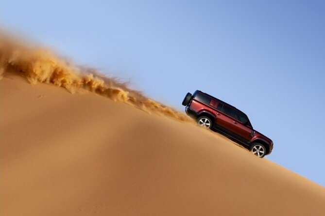 High Red Dunes Thrilling Desert Safari Sand Boarding BBQ Dinner - The desert camp shift: from thrills to Bedouin-style nights